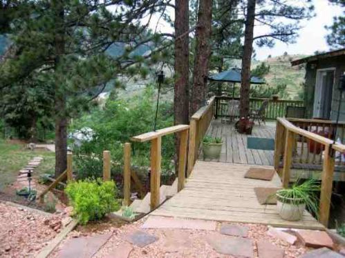 The deck of the vacation home provides relaxing views